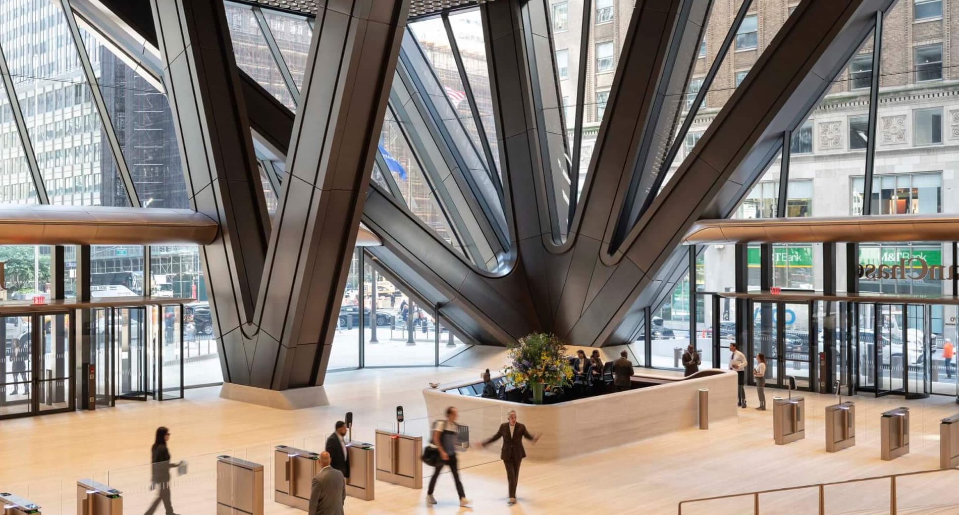 Atmospheric editorial backdrop for the markets tracker — contemporary office atrium